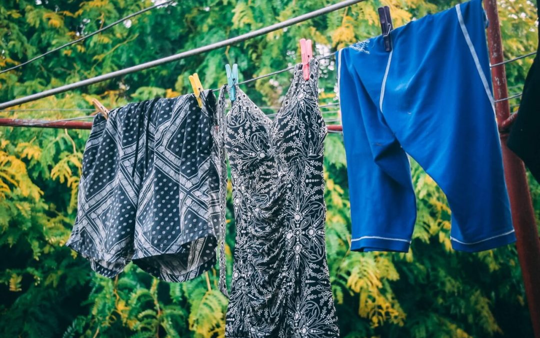 reduce humidity in your home by hanging clothes out to dry